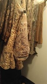 Large selection of men's hunting clothes jumpsuits pants and jackets