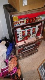 Big action Triple 7 slot machine works great takes tokens