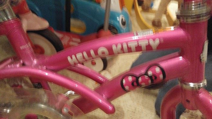 very lightly used new Hello Kitty bike with all the bells and whistles