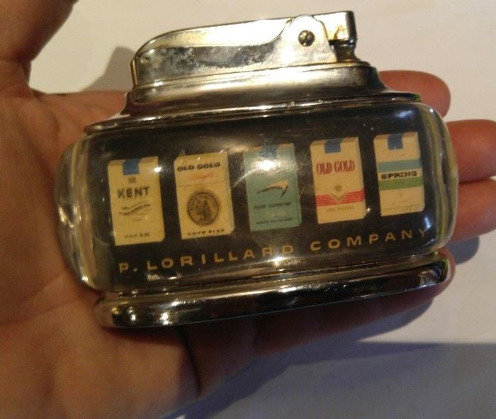 VINTAGE P. LORILLARD CO CIGARETTE Ad TABLE LIGHTER 1960 Mid Century Lucite Mod

q
Thank you for viewing my Listing.

NO SHIPPING TO CHINA !!!
VINTAGE P. LORILLARD CO CIGARETTE Advertising TABLE LIGHTER 1760 to Rare 1960 , 200th anniversary 
Great Mid Century Lucite piece / super cool Mod Look 
Made by Continental 
 we just open the gun say thought it only had ammo but it's got coins lighters and other great trinkets. More pictures coming
