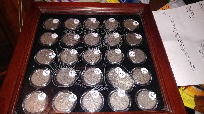 Up for SEALED BID AUCTION AT THE ESTATE SALE are #26 Silver Walking Liberty Half Dollars in a beautiful mahogany Walking Liberty case containing headline news from 1916 to 1947 ( if you do not see the year it is missing if you see duplicates of the year there is more than one coin for that year.   you can come and inspect the coins and leave a sealed bid with the cashier. sealed bids will be opened up on Sunday January 28th at 1 p.m.  you may also text your bid to 706-741-0530 with your name & Bid.
1916 s
1917 S 
1918 s 
1919 s
 1920 s 
1921 s 
1923 s 
1927 s 
1928 s 
1929 s 
1933 s 
1934 s 
1935 S 
1936 ( no mint mark )
1937 s 
1938 s 
1939 s 
1941 s 
1941 s 
1942 s
 1943 S
 1944 S 
1945 s 
1946 s 
1946 s
1947 D
