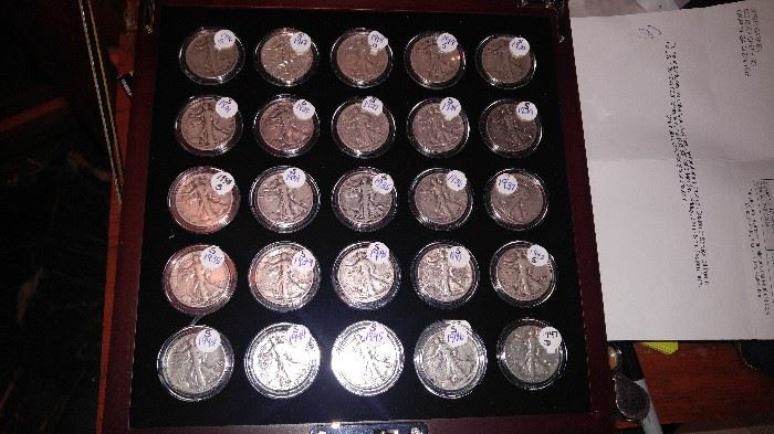 Up for SEALED BID AUCTION AT THE ESTATE SALE are #26 Silver Walking Liberty Half Dollars in a beautiful mahogany Walking Liberty case containing headline news from 1916 to 1947 ( if you do not see the year it is missing if you see duplicates of the year there is more than one coin for that year.   you can come and inspect the coins and leave a sealed bid with the cashier. sealed bids will be opened up on Sunday January 28th at 1 p.m.  you may also text your bid to 706-741-0530 with your name & Bid.
1916 s
1917 S 
1918 s 
1919 s
 1920 s 
1921 s 
1923 s 
1927 s 
1928 s 
1929 s 
1933 s 
1934 s 
1935 S 
1936 ( no mint mark )
1937 s 
1938 s 
1939 s 
1941 s 
1941 s 
1942 s
 1943 S
 1944 S 
1945 s 
1946 s 
1946 s
1947 D
