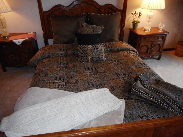 KIng Bedding on Bed. Sold as Set. Comforter, Shams, Dust ruffle, Decorative Pillows..Gold/black