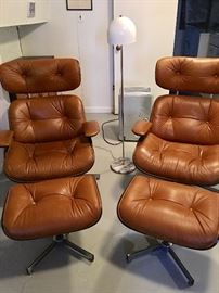 Pair/1960 MCM  Eames-style lounge chairs and ottomans by Selig