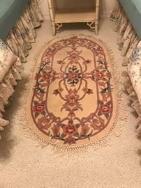 One of a pair of Abusson oval rugs