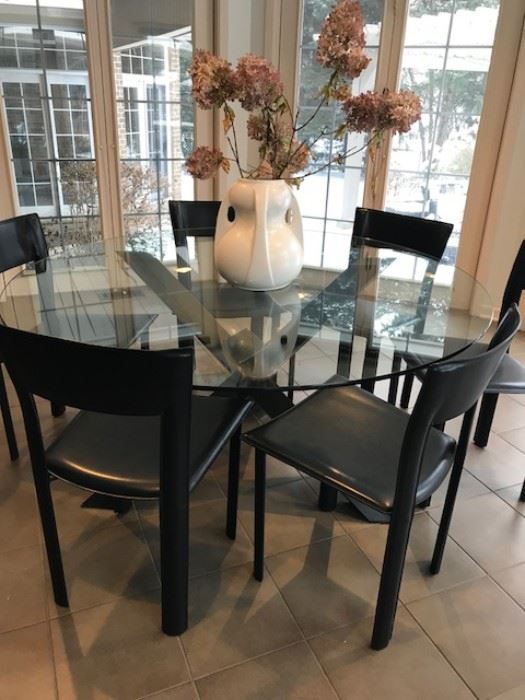 Crate and Barrel Apex 60" round glass top dining table $750