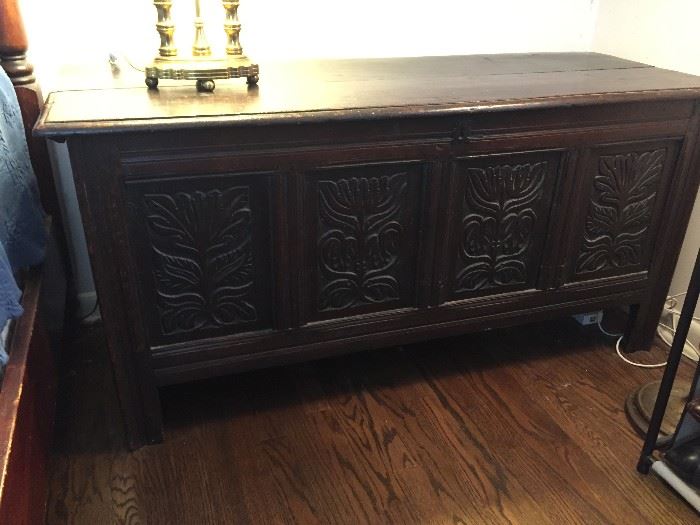 My favorite, an antique English carved oak coffer or blanket chest.