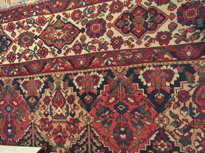This is an antique Persian Bahkatryia rug,  11'8" x 15'3"