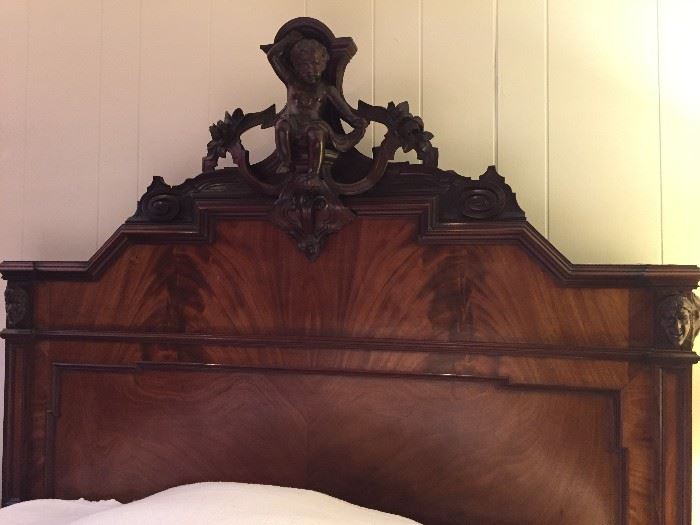Antique 19th Century crotch mahogany bed.  Detail everywhere!