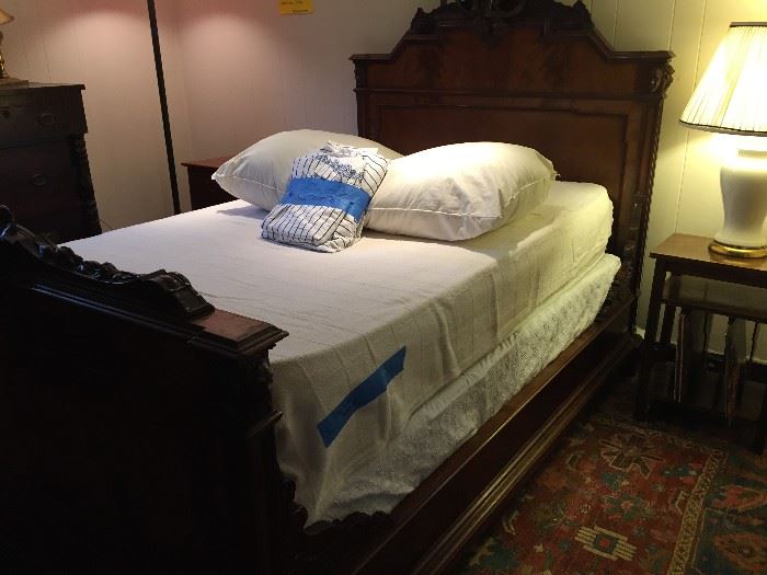 This magnificent antique bed has a new, custom made pillow top mattress that has a zip-off top.  