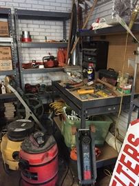 Steel shelving units, tools, and a great workbench.