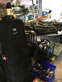 Golf club bag, clubs, luggage, especially the Orvis canvas and leather.