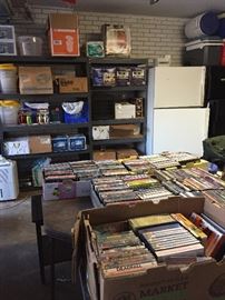 Cases and cases of glassware and catering supplies, two refrigerators, three freezers, and loads of vintage movies on DVD.