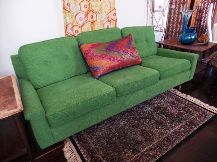 Vibrant green mid-century couch