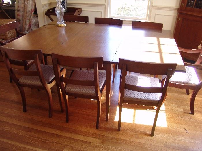 Mahogany dining table and 8 chairs, circa 1950