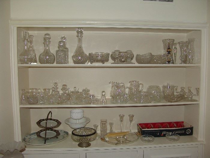 Assortment of crystal glassware, pitchers, vases, candlesticks, and decanters