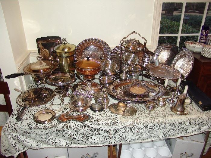 Assortment of silver plate including chaffing dish, well in tree platters, trays, and vessels