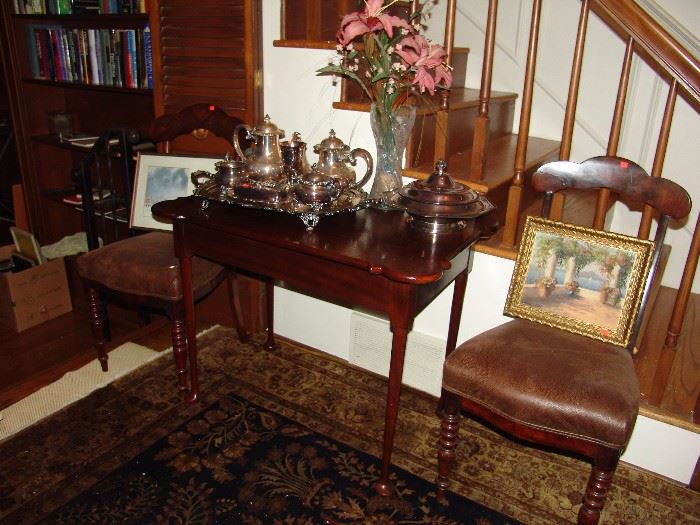 Mahogany table and silver plate tea and coffee service