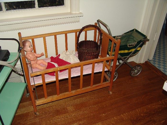 Doll and bed and buggy