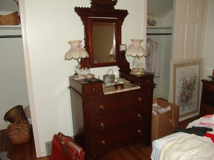 Antique dresser with lady head lamps