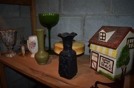 In the forefront is a Mourning Glass Vase, Florentine Vase, Cookie Jar, etc.