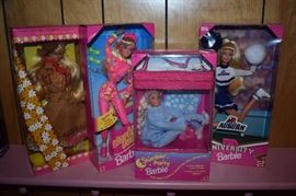 Loads of Vintage Dolls and Accessories in this Estate! From Barbies to Elvis to Back Street Boys to 90210 to Country Music Dolls Plus Accessories Galore especially for Barbie! We also have Vintage Ty Beanie Babies and Disney Characters --- A large collection represented here as you can see! We even have a large collection of Barbie Ornaments and Bradbury Mint Porcelain Barbie Figurines!