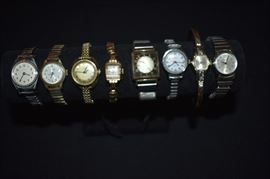 Vintage Jewelry: Necklaces, Earrings, Bracelets, Brooches, Watches  - Makers of Watches from left to right are: Timex, Lucerne, Timex Electric, Benrus ( with ribbon of red, yellow, blue under the Benrus name ),  Bulova ( with Swiss Movement ), Timex Electric, Timex, & Timex Quartz
