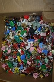 Box full of the 1950's- early 60's Penny Machine Toys and Charm