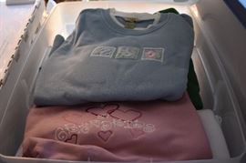 Tubs of Like New Clothing including Sweatshirts, and T-Shirts and More!
