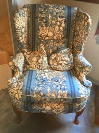 Wing back chair with vintage upholstery 