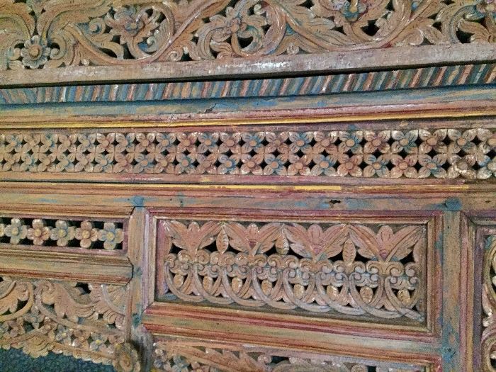 Close up of carved headboard 