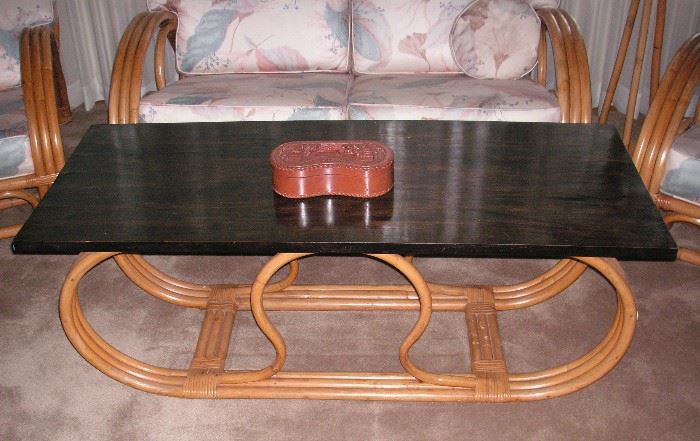 Coffee table has matching end tables