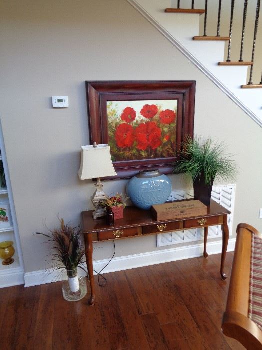 sofa table and poppies painting