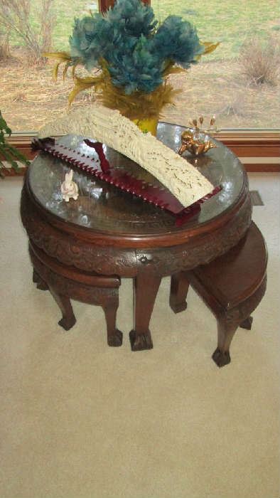 Carved oriental table and benches