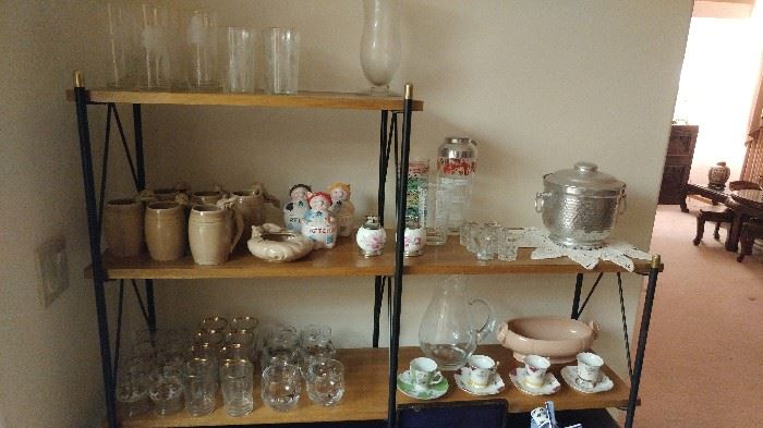 Mid Century Modern shelf and lots of retro glassware and bar ware

