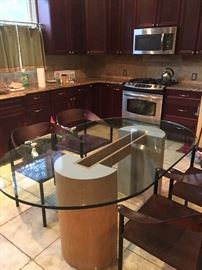 Glass top dining table & 4 vintage leather chairs 