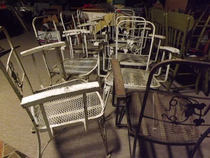 multiple iron patio chairs from the warehouse