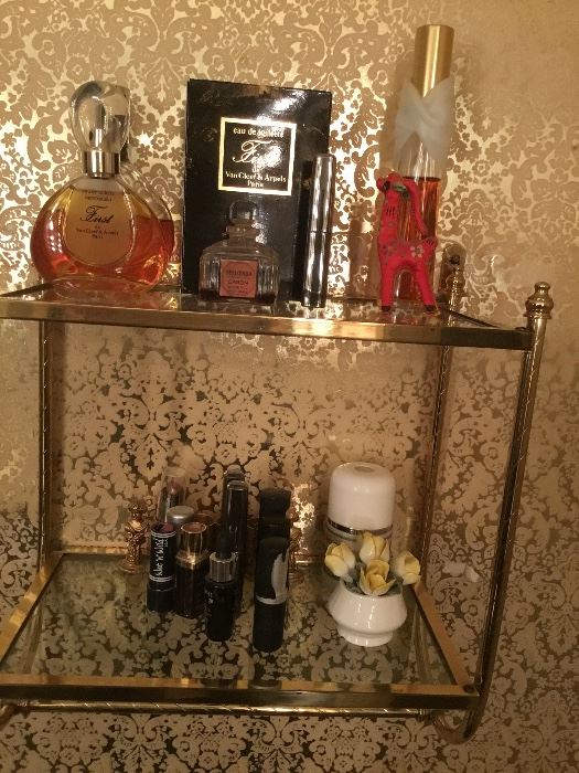 Vintage brass/glass shelf and cologne 