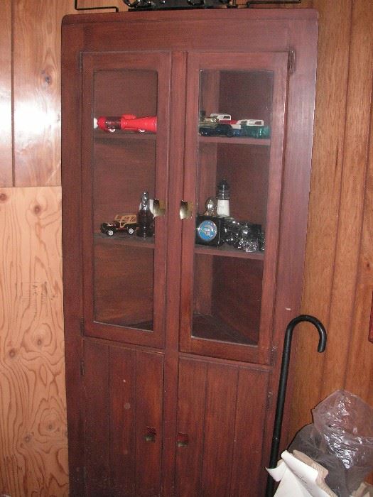 Corner cabinet w/Avon car bottles