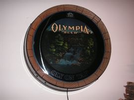 Vintage Olympia beer sign "Oly on Tap"
