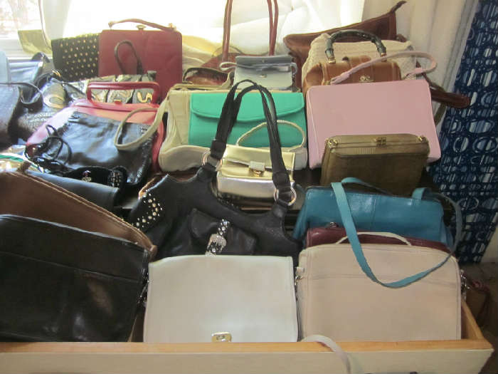 Large selection of purses and hand bags