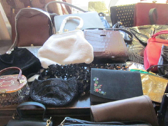 Large selection of purses and hand bags