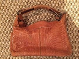 48. Tod's Tan Alligator Handbag