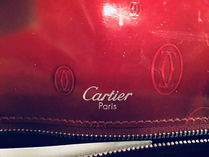 42. Cartier Paris Burgundy Leather Handbag