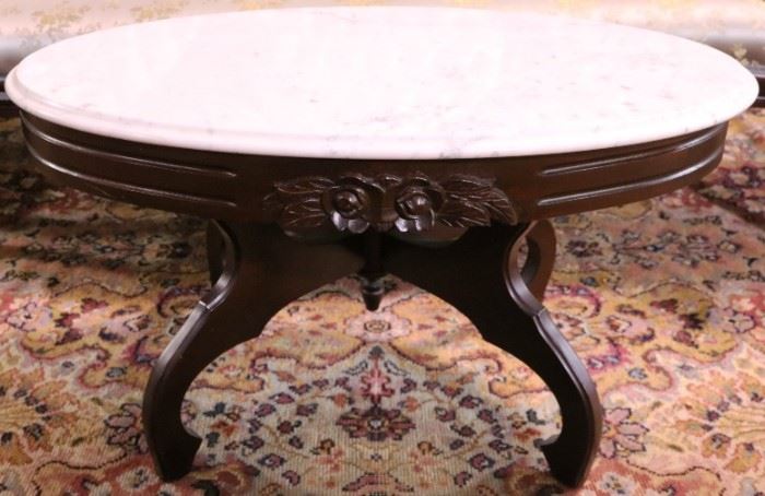 Rose carved oval coffee table