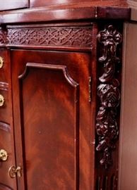 Flaming mahogany intricately carved