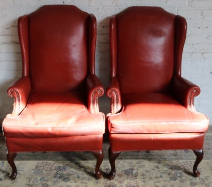 Matching pair leather chairs
