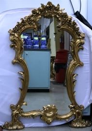 Carved French gilded console mirror