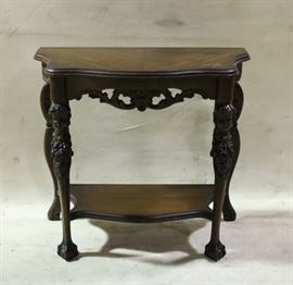 Figural carved console table
