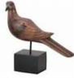 Guildmaster carved bird on stand